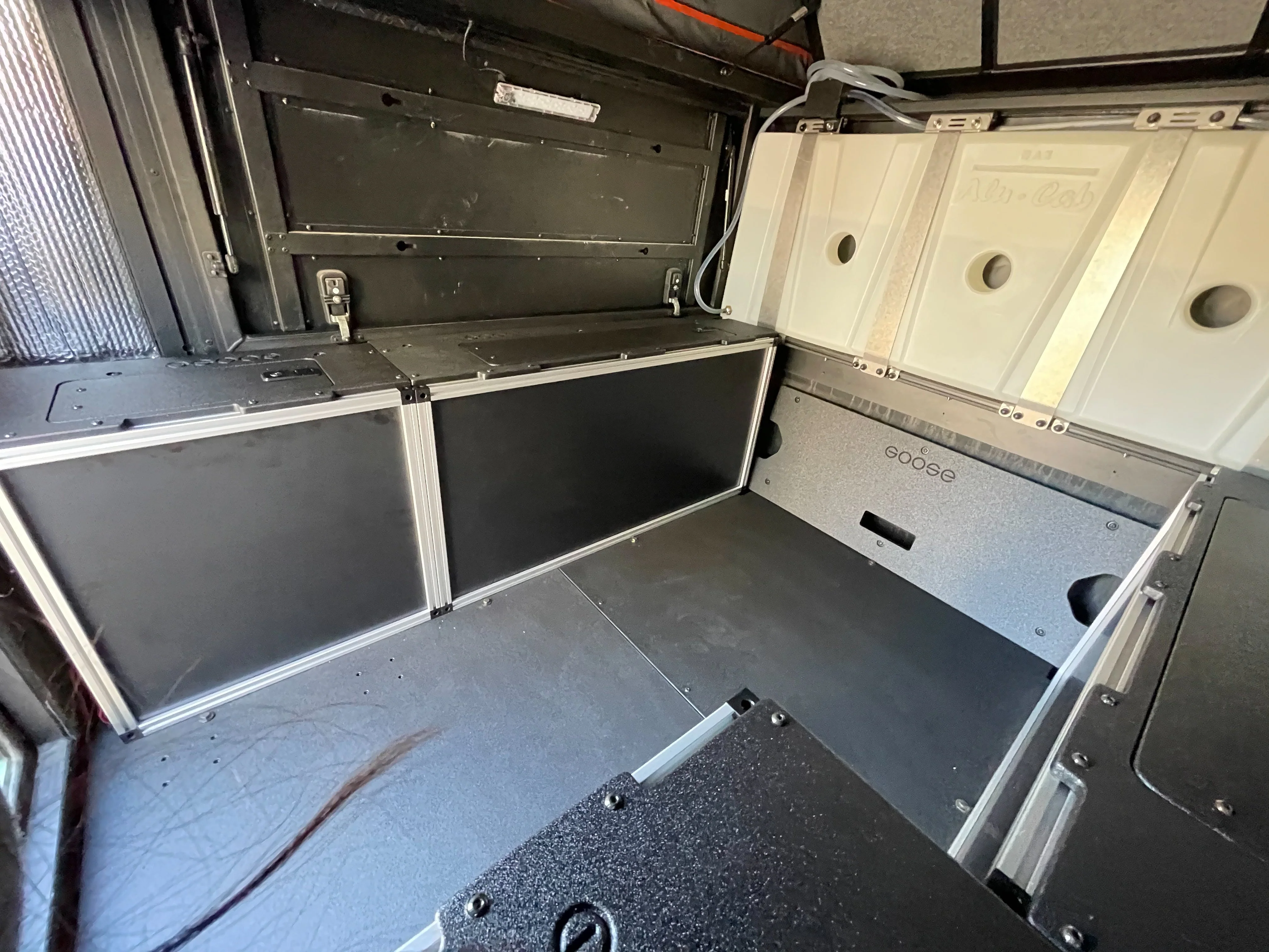 Alu-Cab Canopy Camper V2 - Toyota Tacoma 2005-Present 2nd & 3rd Gen. - Front Utility Module - 6' Bed - Image 3